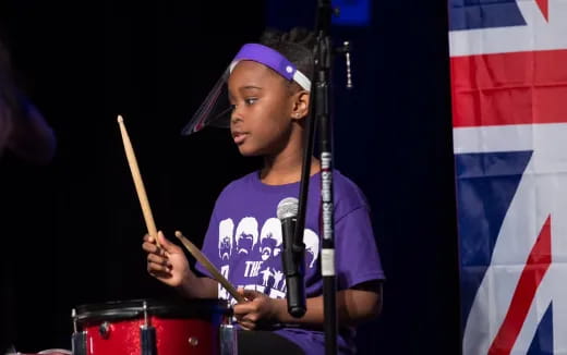 a man playing drums