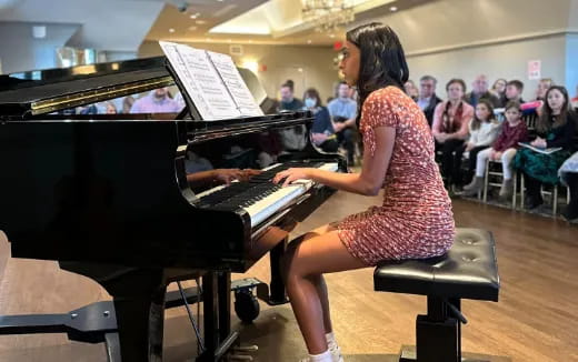 a person playing a piano