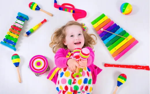 a child holding a toy