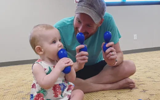 a person holding a baby