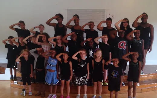 a group of girls posing for a photo