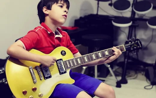 a person playing a guitar