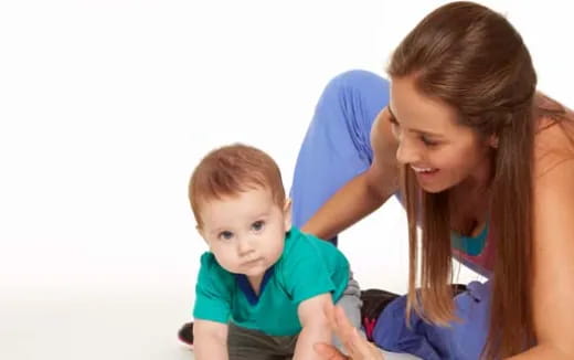 a person holding a baby