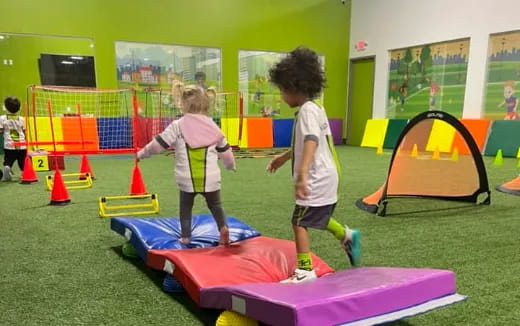 children playing on a mat