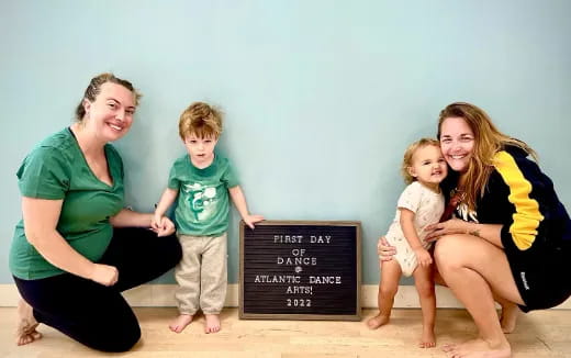 a woman and two children