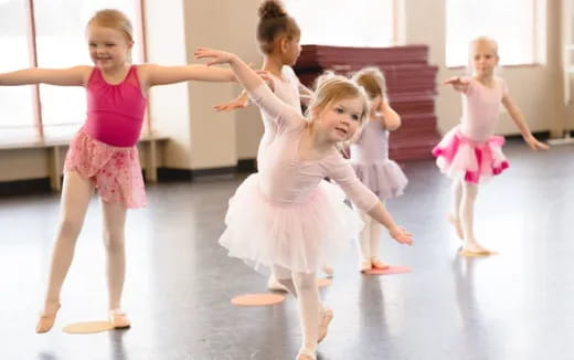 a group of children dancing