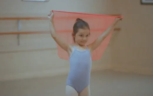 a girl in a blue dress