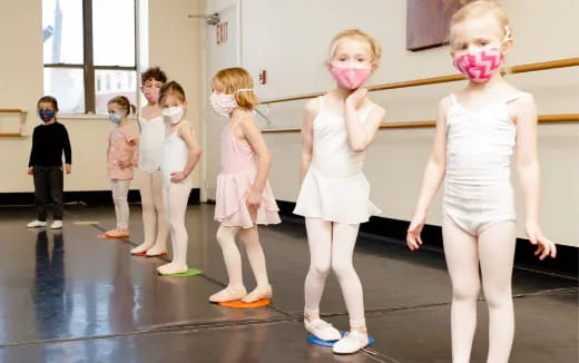 a group of children wearing clothing
