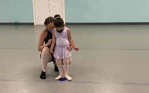 two girls in dresses