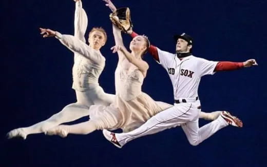 a man throwing a baseball