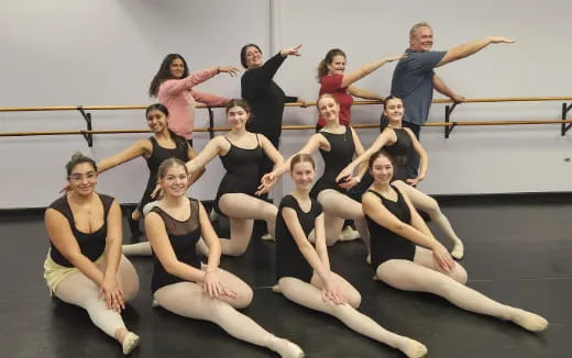 a group of people posing for a photo