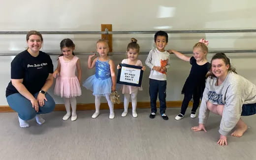 a group of people posing for a photo