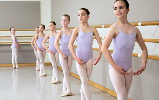 a group of women in white