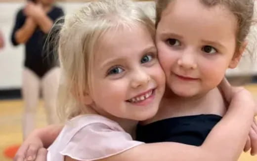 a boy and girl smiling