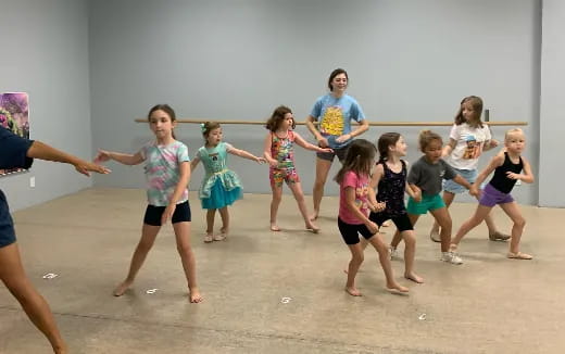 a group of children dancing