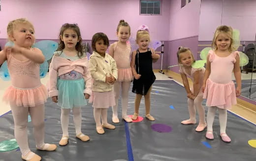 a group of girls posing for a photo
