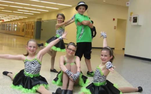 a group of people posing for a photo