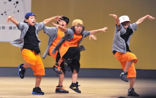 a group of boys jumping