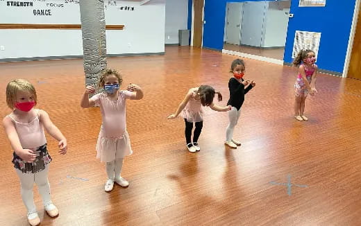 a group of children dancing