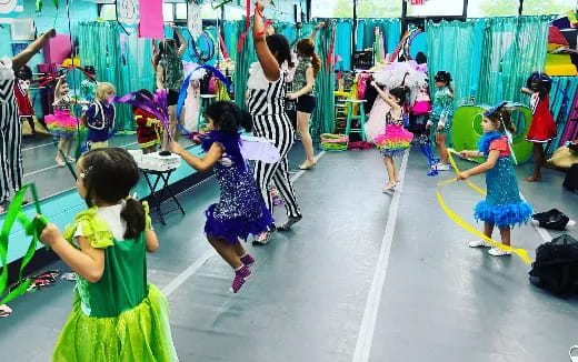 a group of children dancing