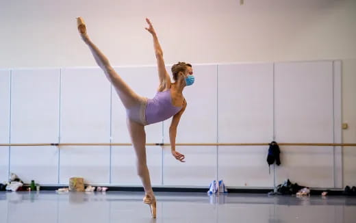 a woman doing gymnastics