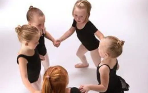a group of children dancing