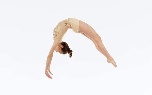 a man in a white dress