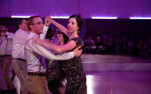 a man and woman dancing
