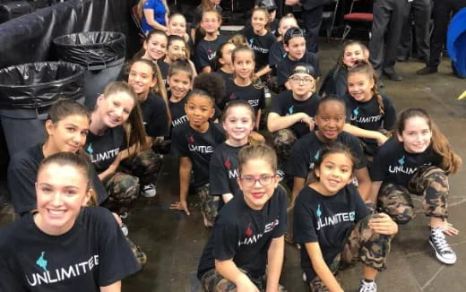 a group of people posing for a photo