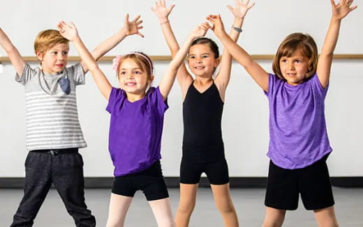 a group of children posing for a photo