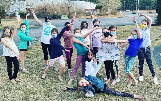 a group of people posing for a photo