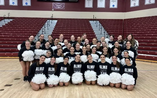 a group of people in a gym