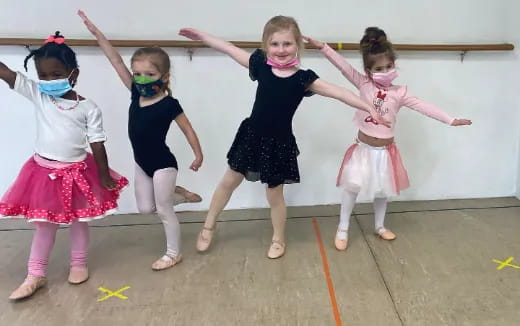 a group of girls wearing clothing