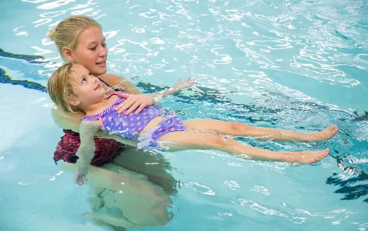 two girls in a pool