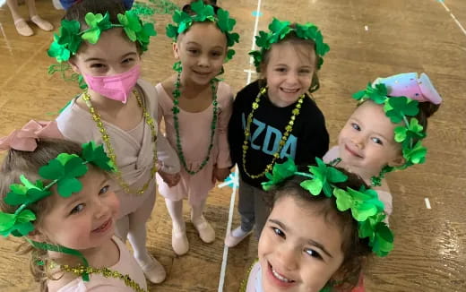 a group of girls wearing clothing