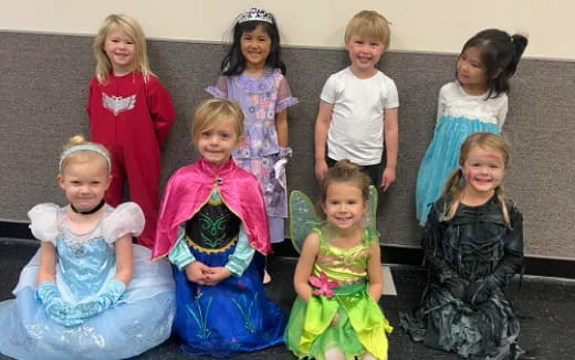 a group of children posing for a photo