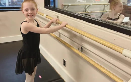 a girl in a black dress