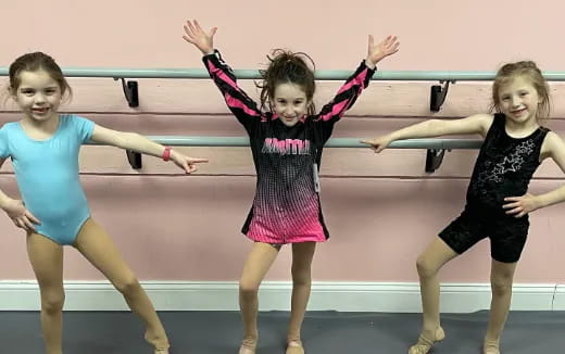 a group of girls dancing