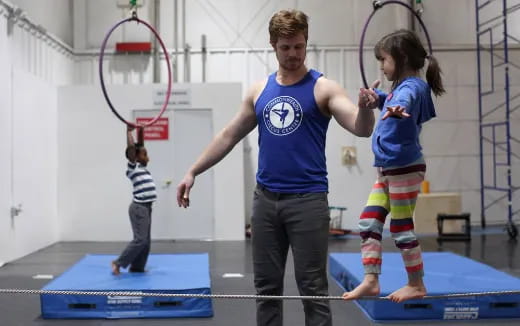 a person and a girl playing a game