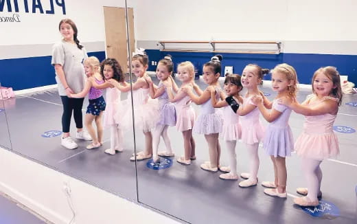 a group of girls in a line