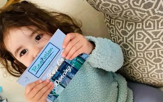 a girl reading a book