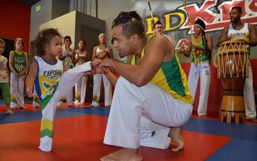 a man holding a trophy