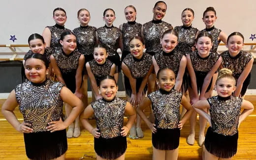 a group of people posing for a photo