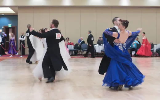 a man and woman dancing