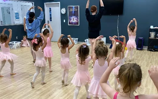 a group of children dancing