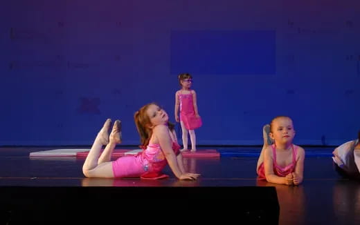 a group of women on a stage