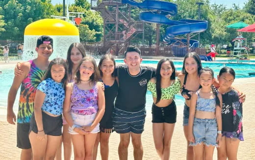 a group of people posing for a photo