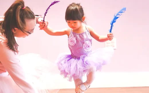 a person holding a child