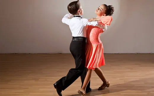 a man and woman dancing
