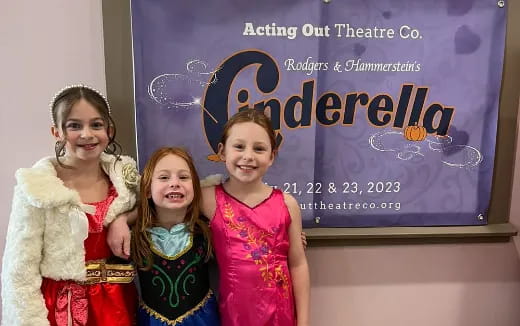 a group of girls posing for a photo